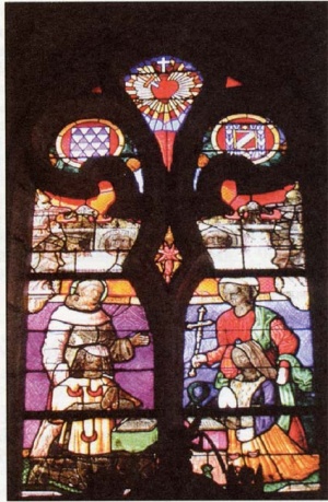 Fig. 3. - Ergué-Gabéric, église Saint-Guinal, vitrail de Kergonan, début du XVIe siècle.François du Liziart, sr de Kergonan, est présenté par saint François d'Assise ; sa femme est présentée par sainte Marguerite. Cliché N. Bernard.